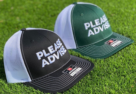 A trucker hat that says 'Please Advise' on it